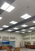 Ceilings are opened up for the installation of the sprinkler system.